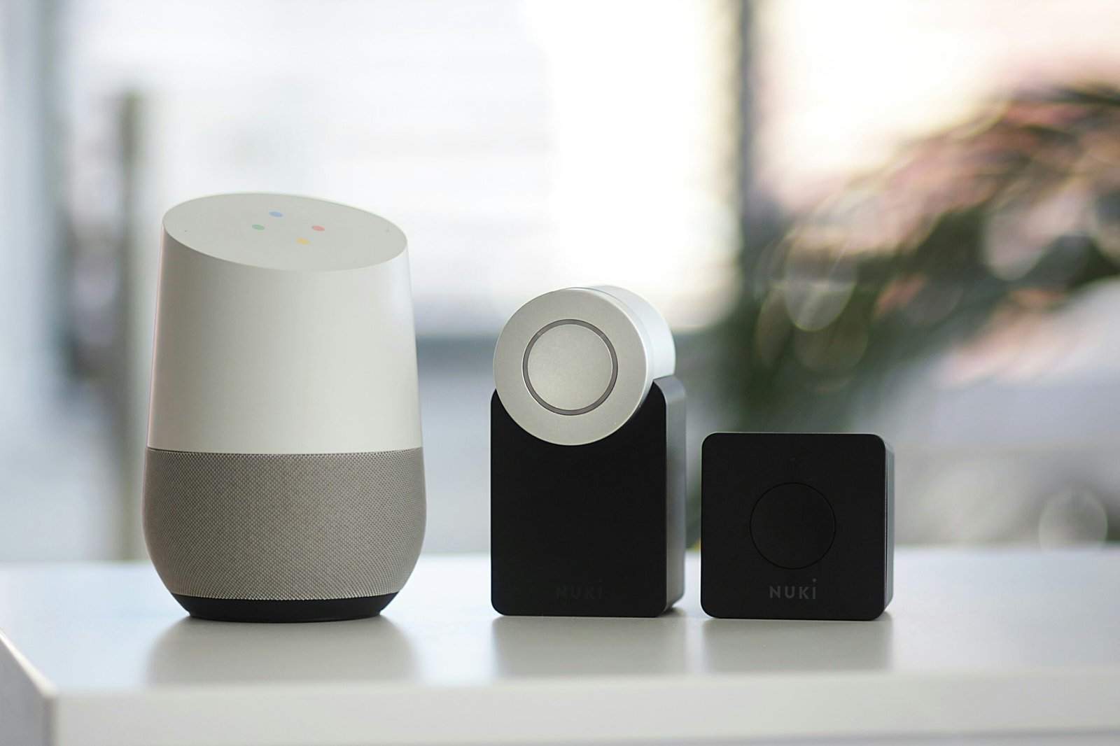 An image featuring several Google Home Mini devices, compact smart speakers that enable voice-controlled assistance and seamless integration with smart home technology.